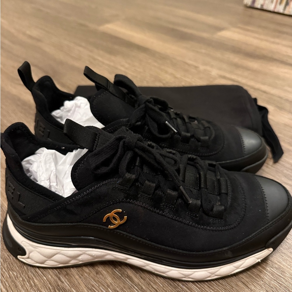 CHANEL Black Sneakers with Gold Logo